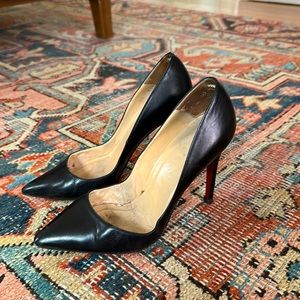 Louboutin leather pumps in black. 5” heel. Size EU 38 (U.S. 7.5)